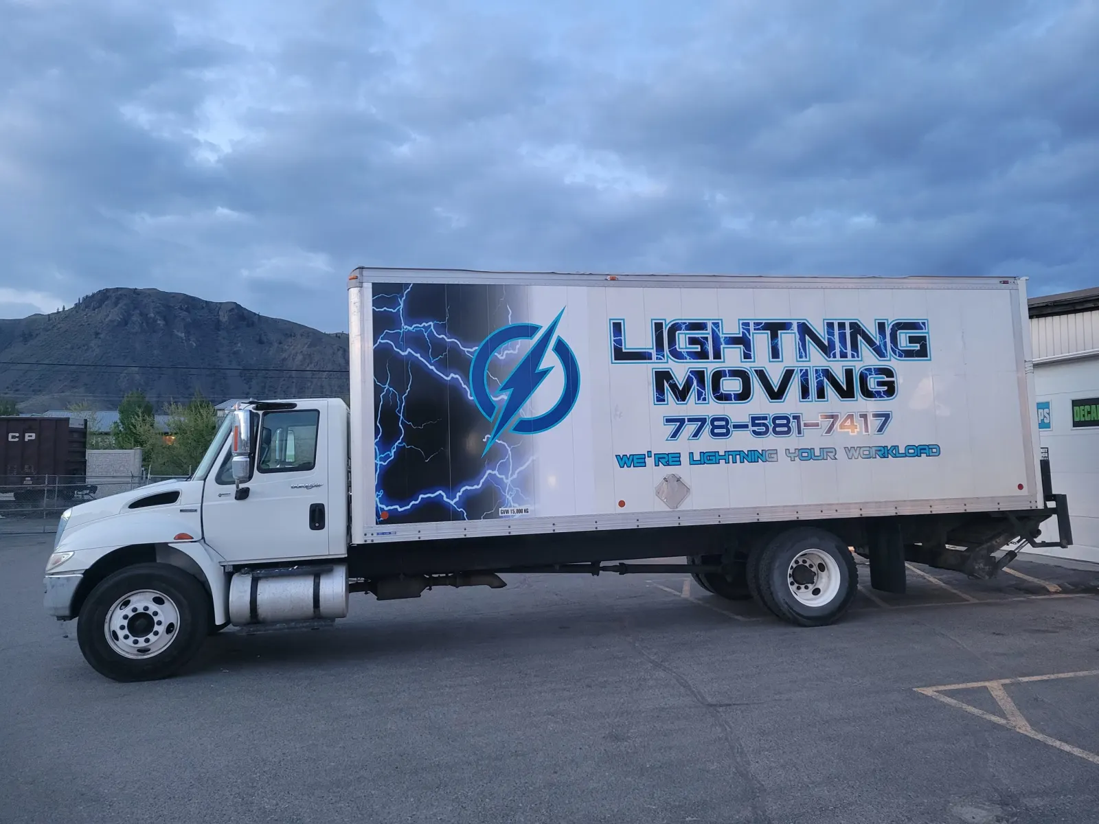 The Team Lightning Moving box truck parked in Kamloops